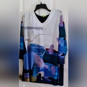 Stunning array of color on this navy shirt remind me of Picasso.